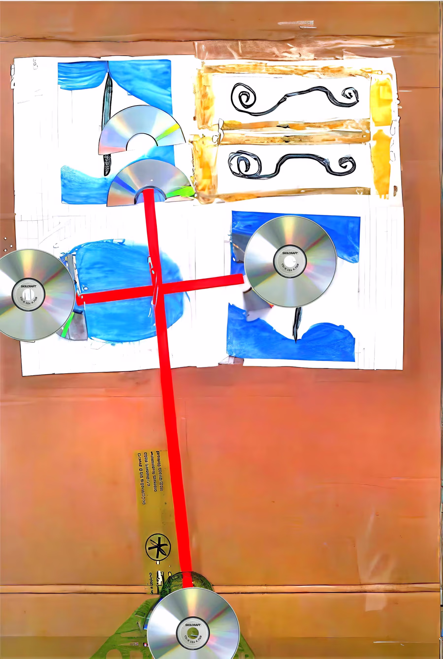 Cross with Discs