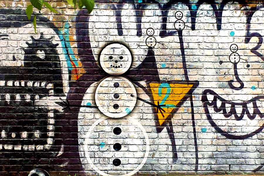 Snowmann on Brick Wall
