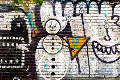 Snowmann on Brick Wall